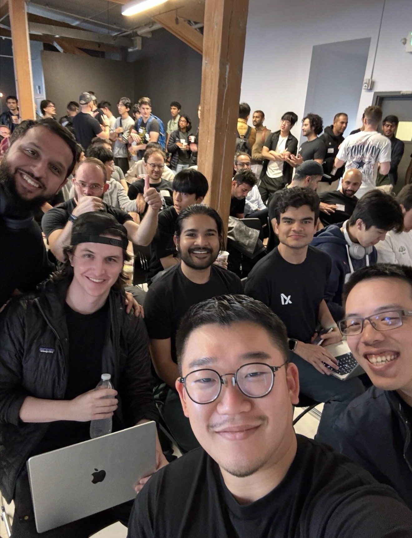 Selfie with a packed room of hackathon builders
